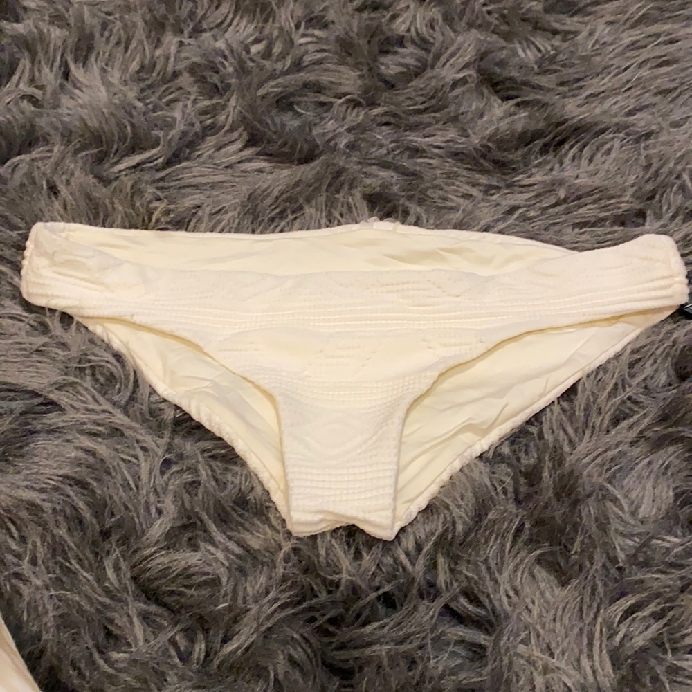 Women's Cream colored, brand vitamin A bikini bottom , size XS, NWT